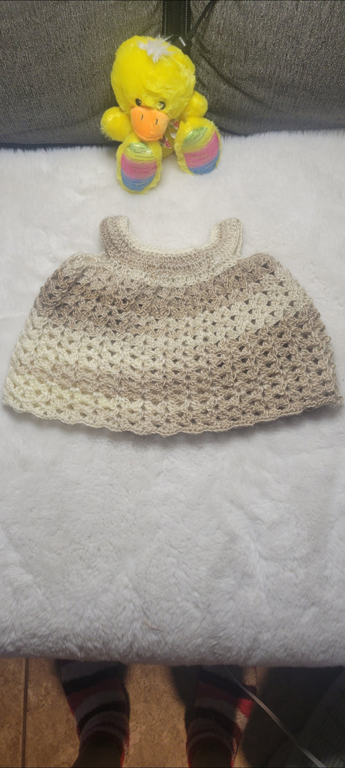 A Cute Tan Newborn dress