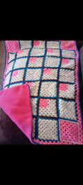 Baby blanket fleece-lined with a granny square pattern.  Measures 36"x30."  This is made upon at the time of order.